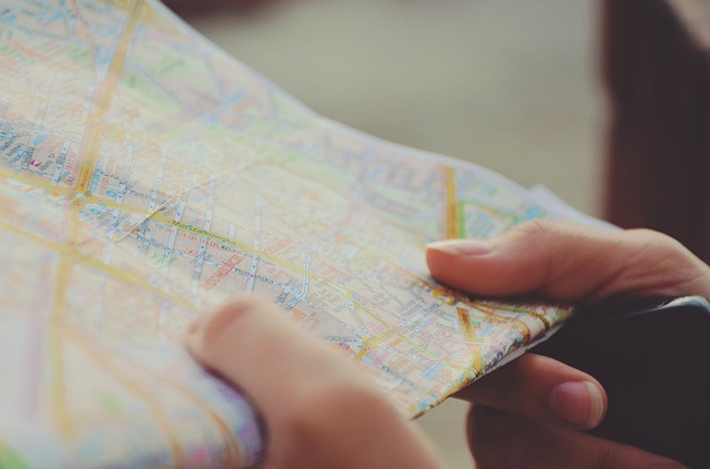 person looking at a map of unfamiliar area